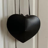 <tc>Años 60</tc> Bolso retro con forma de corazón